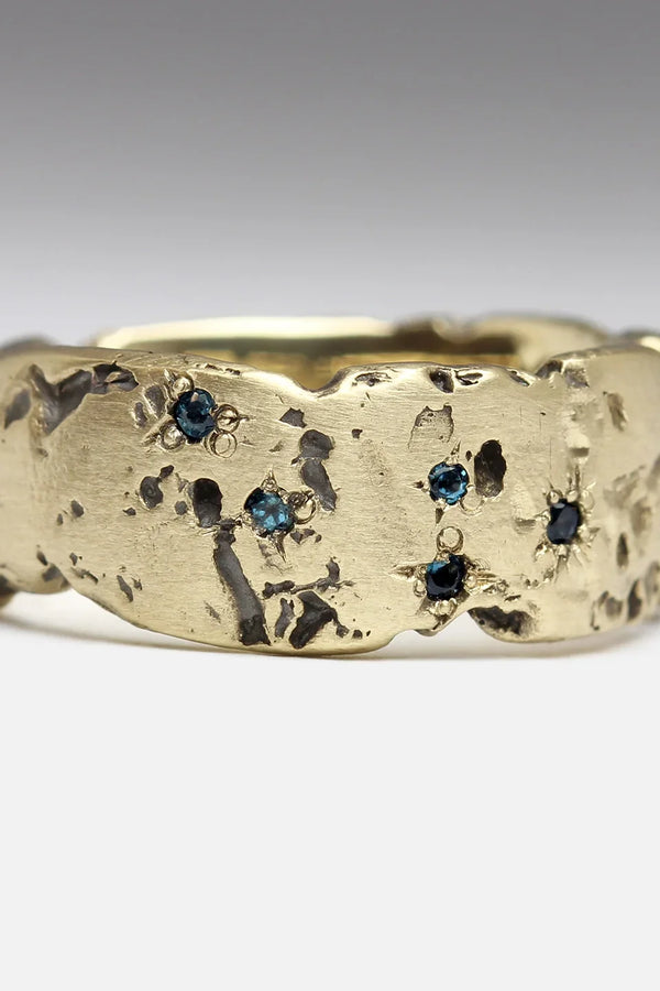 Antique Golden Forged Ring with Blue Inlaid Crystal