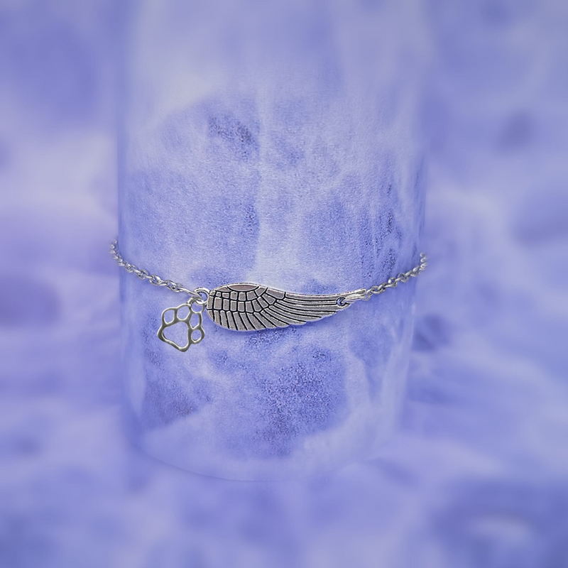 Handcrafted Silver Memorial Bracelet with Angel Wing and Paw Print Design