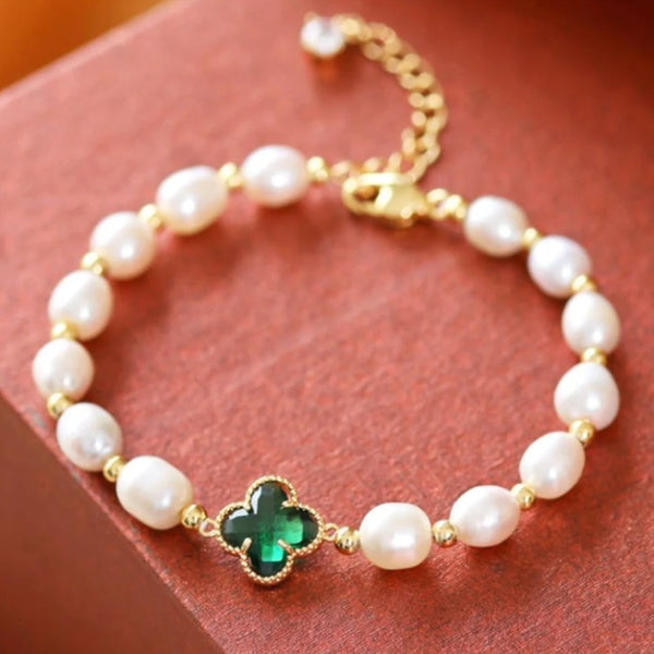 Gold Emerald Cloverleaf Bracelet Adorned with Emeralds and Pearls