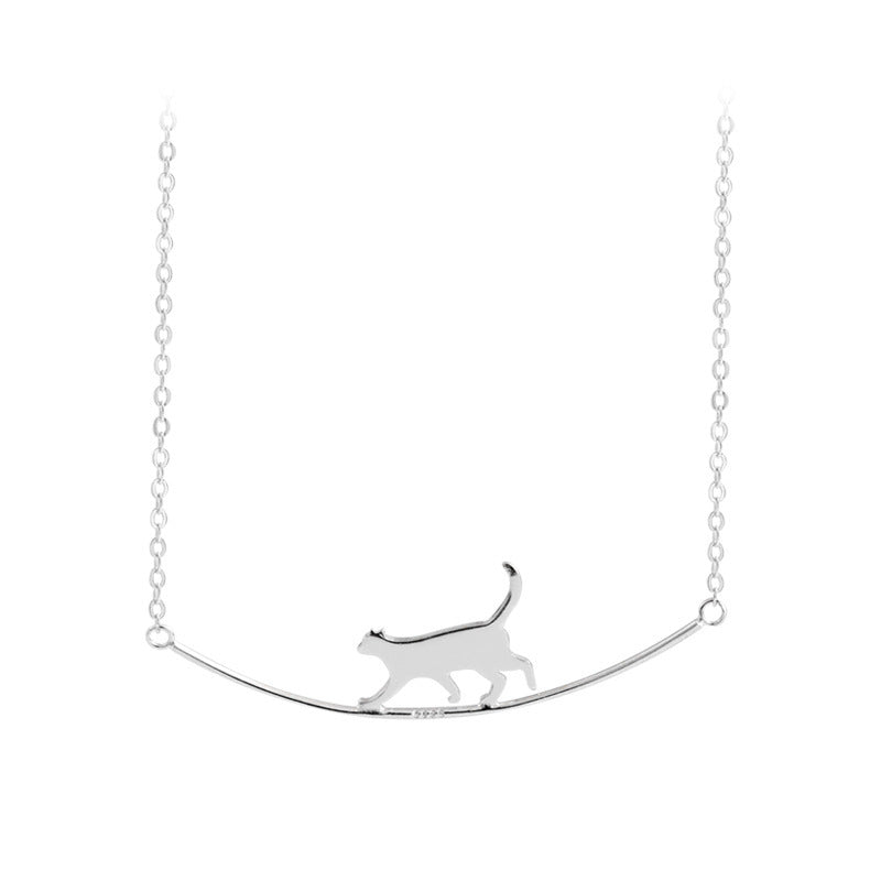 Silver Pendant Necklace Featuring a Playful Kitten