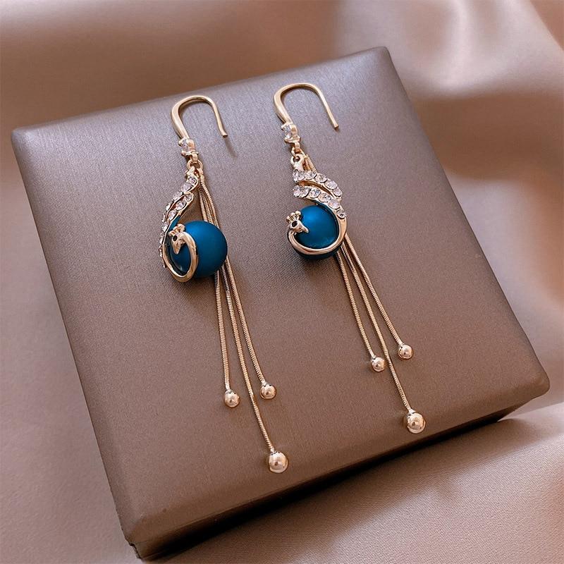 Holiday Earrings Adorned with Blue Pearls