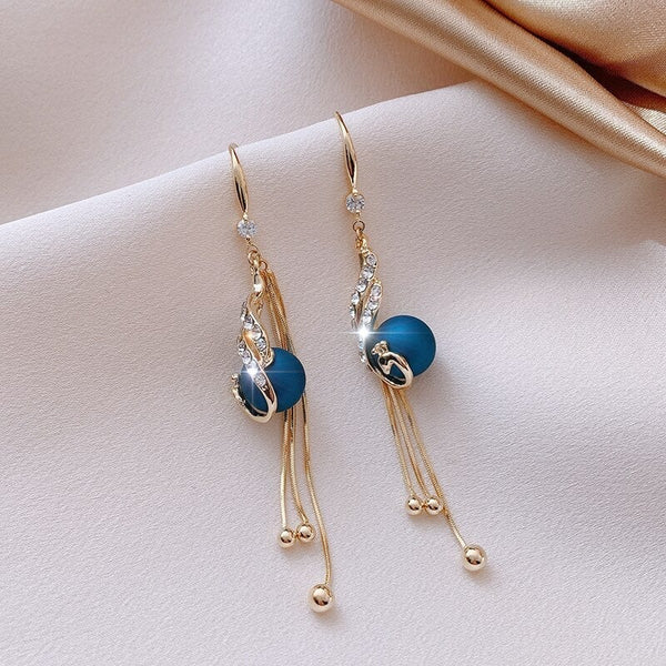 Holiday Earrings Adorned with Blue Pearls