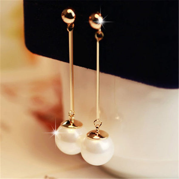 Elegant Dangle Earrings Featuring Unique Handcrafted Pearls
