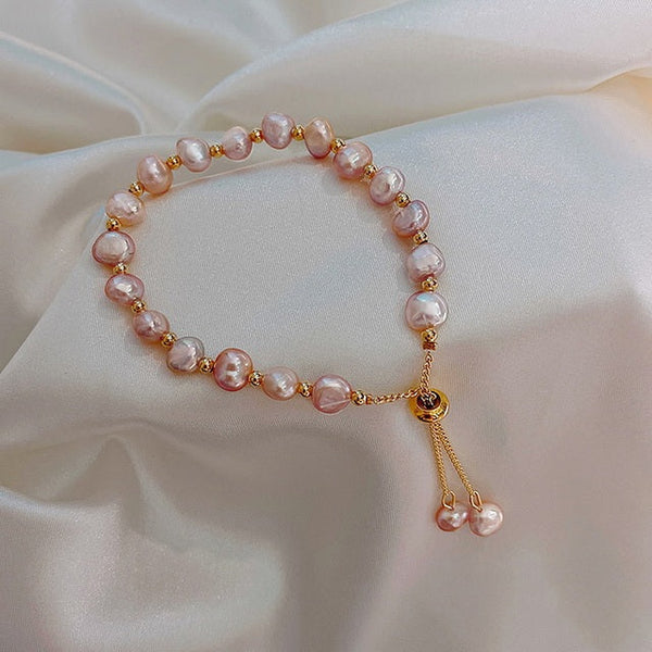 Gold Bracelet with Pink Pearl Accents
