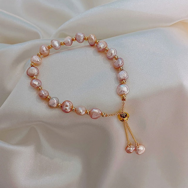 Gold Bracelet with Pink Pearl Accents