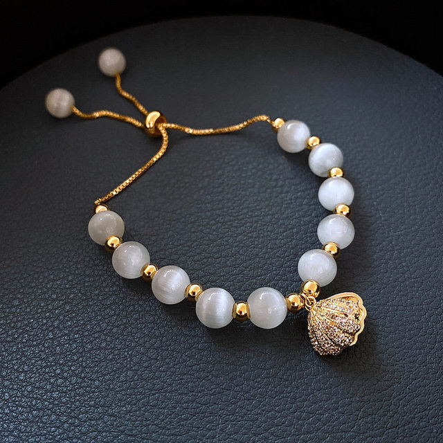 Gold Pearl-Accented Shell Bracelet