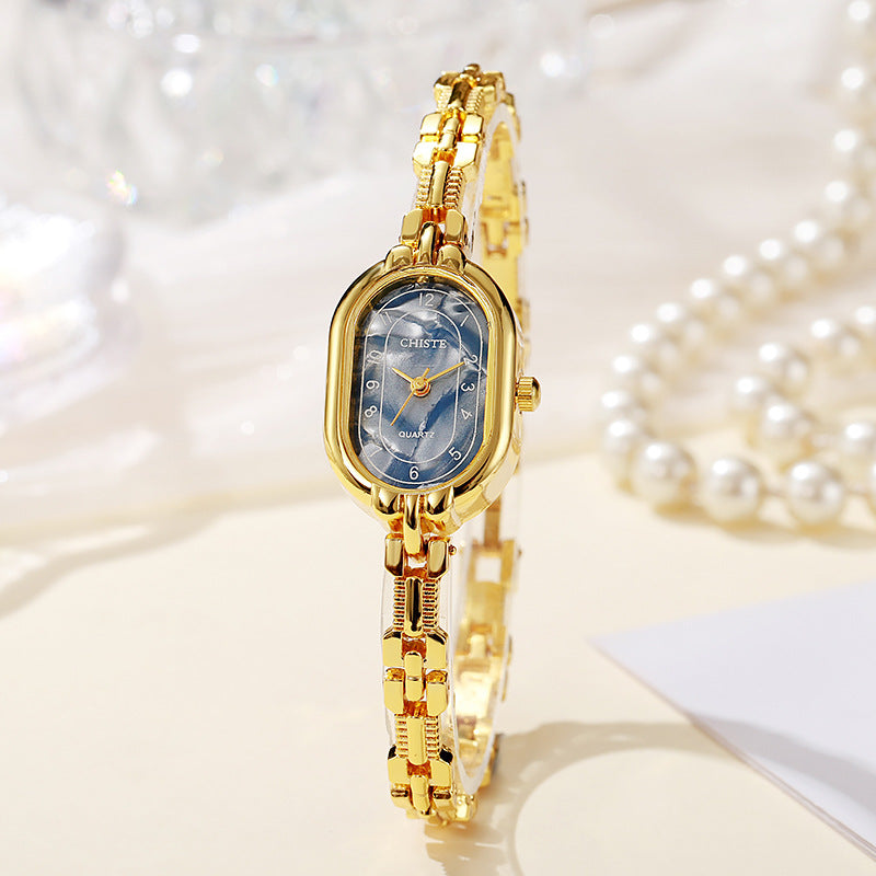 Alira - Radiant Gold Timepiece