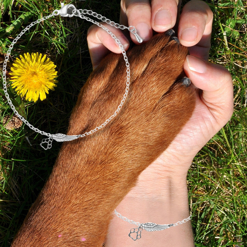 Handcrafted Silver Memorial Bracelet with Angel Wing and Paw Print Design