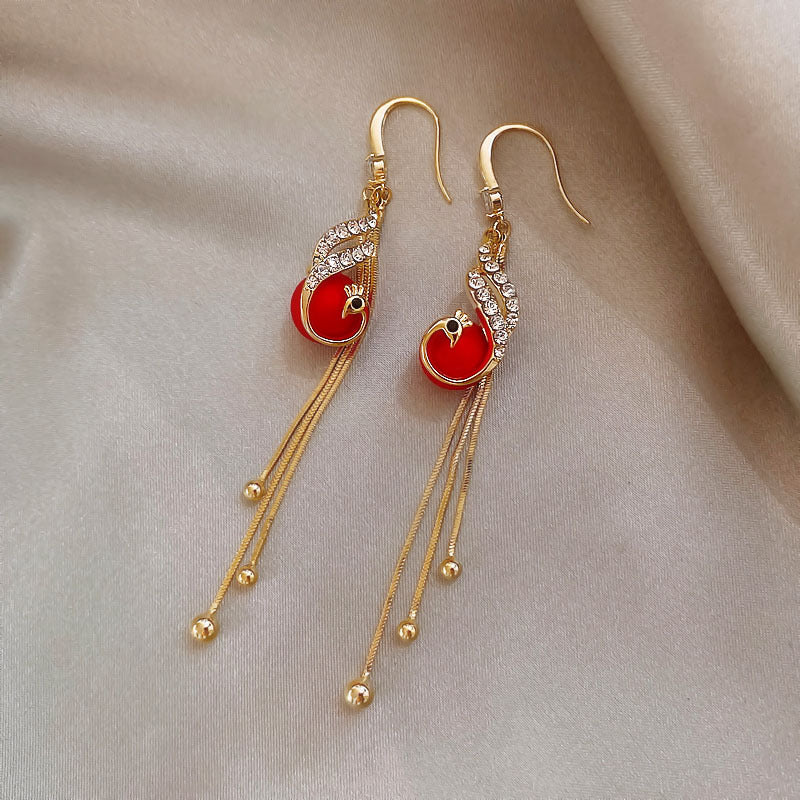 Holiday Earrings Adorned with Blue Pearls