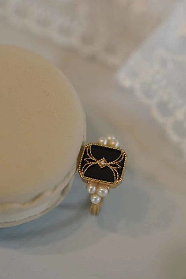 Gold Adjustable Black Enamel Ring Adorned with Pearls
