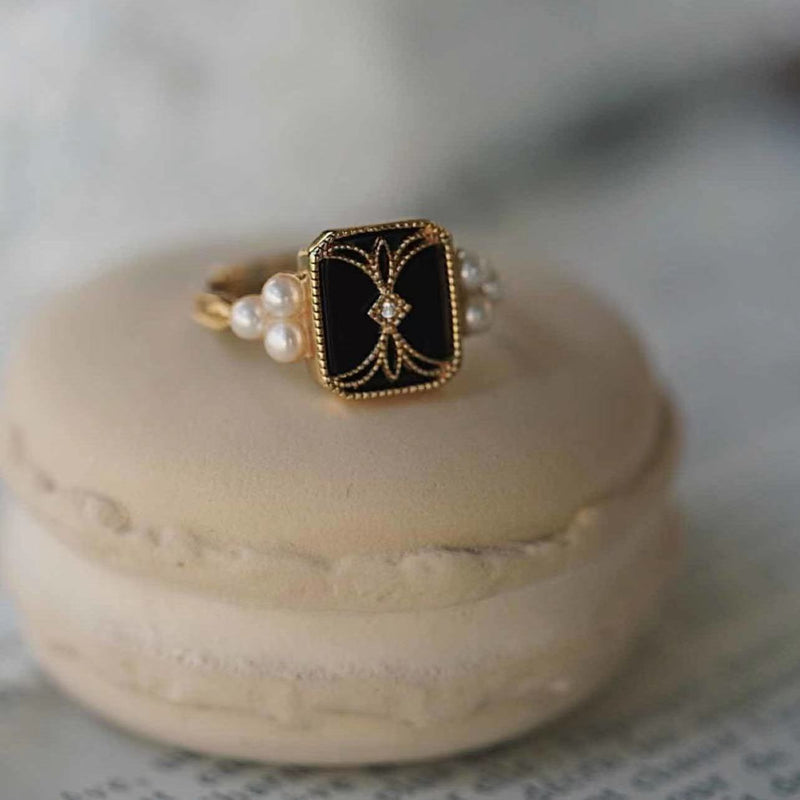 Gold Adjustable Black Enamel Ring Adorned with Pearls