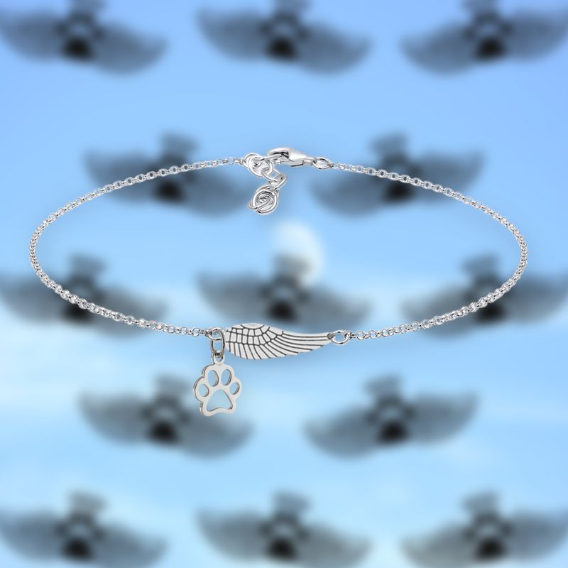 Handcrafted Silver Memorial Bracelet with Angel Wing and Paw Print Design