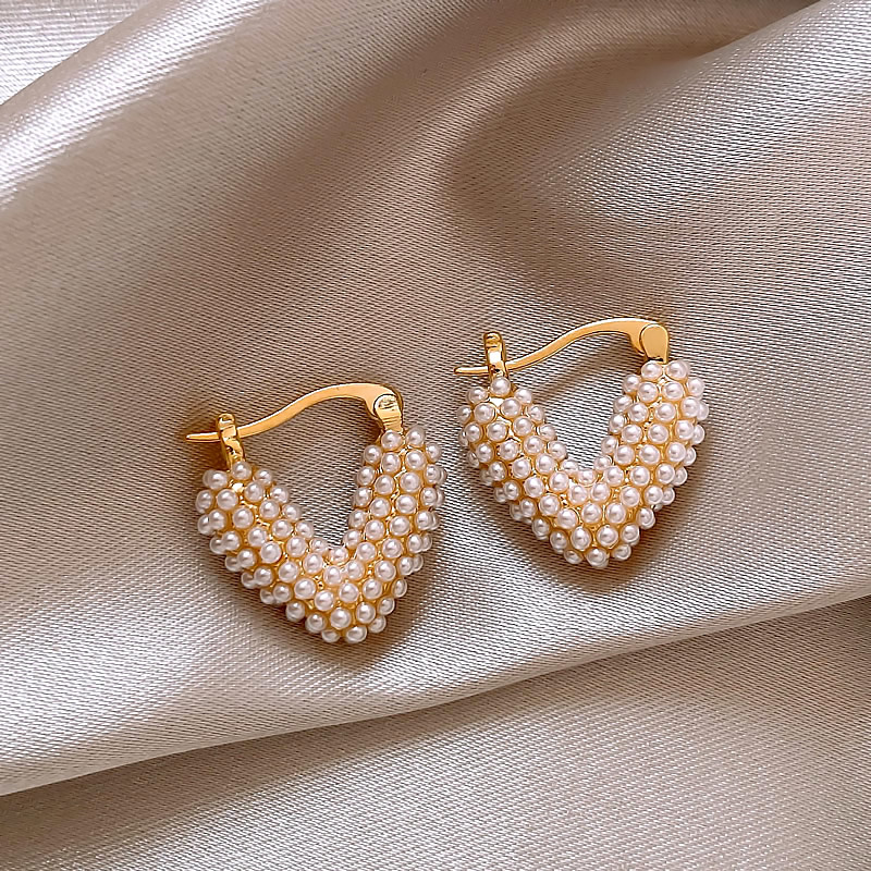 Chic Heart-Shaped Earrings Adorned with Inlaid Pearls